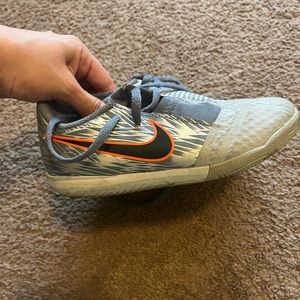 Gray Nike phantom venom shoes